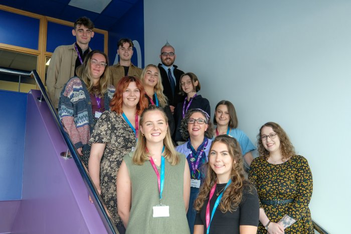 Group photograph of some of our Higher Education Engagement Assistants in a stairwell